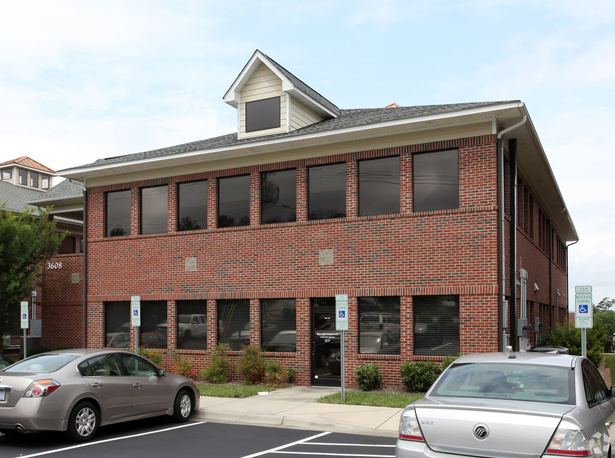 Two-story brick office building at 3608 Shannon Road, Durham