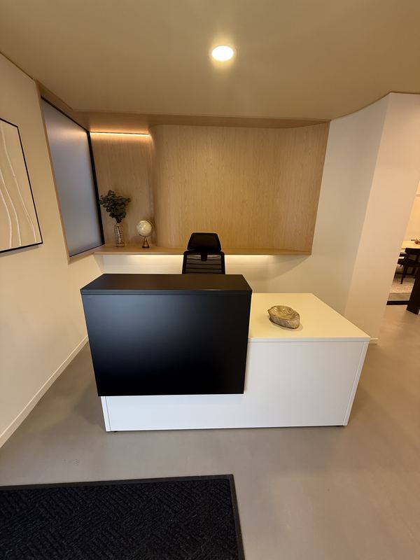 Reception desk with wood paneling